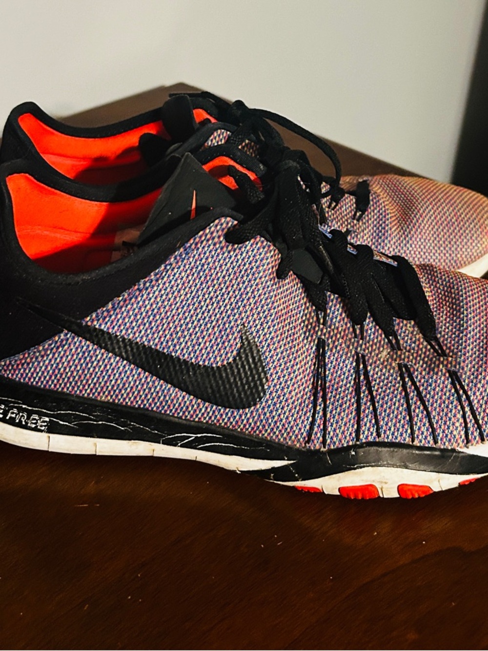 Nike Multicolor Knit Running Shoe with Black Swoosh and Bright Orange Lining